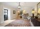 Inviting lobby featuring a stylish rug, charming decor, and elegant lighting fixtures at 67 Legare St # 305, Charleston, SC 29401