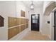 Mailboxes in a hallway with a black door and overhead lighting at 67 Legare St # 305, Charleston, SC 29401