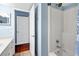 Bathroom featuring vanity with sink, toilet, and open shower with glass door at 796 Summerwind Cir, Edisto Beach, SC 29438