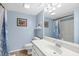 Cozy bathroom featuring a vanity, mirror, toilet, and shower-tub combo at 796 Summerwind Cir, Edisto Beach, SC 29438