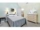 Bedroom with neutral carpet, and ample closet space at 796 Summerwind Cir, Edisto Beach, SC 29438