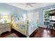Comfortable bedroom with a large bed, closet, and plenty of natural light at 796 Summerwind Cir, Edisto Beach, SC 29438