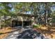 Two-story home with staircase, parking and lush greenery at 796 Summerwind Cir, Edisto Beach, SC 29438