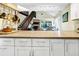 Open-concept kitchen view, showcasing counter space and an adjacent living area at 796 Summerwind Cir, Edisto Beach, SC 29438