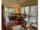 Bright living room with lots of natural light, comfortable seating, and wood floors at 796 Summerwind Cir, Edisto Beach, SC 29438