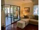 Comfortable living area with sliding glass doors and natural light at 796 Summerwind Cir, Edisto Beach, SC 29438