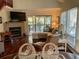 Bright living room with lots of natural light, comfortable seating, and wood floors at 796 Summerwind Cir, Edisto Beach, SC 29438