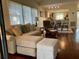 Bright living room with wood floors and casual dining area at 796 Summerwind Cir, Edisto Beach, SC 29438