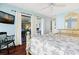 Bright bedroom featuring a light blue walls, and a private balcony entrance at 796 Summerwind Cir, Edisto Beach, SC 29438
