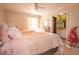 Sunlit bedroom with cozy twin beds and an attached ensuite bathroom, decorated with personal touches at 8020 Nantuckett Ave, North Charleston, SC 29420