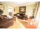 Cozy living room with hardwood floors, comfortable seating, and stylish decor, perfect for relaxation at 8020 Nantuckett Ave, North Charleston, SC 29420