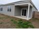 This back patio features a porch roof, siding, and a sliding glass door at 911 Woodside Creek Ln, Summerville, SC 29486