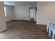 This living room has hardwood flooring, neutral paint colors, and great natural lighting at 911 Woodside Creek Ln, Summerville, SC 29486