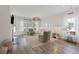 Cozy living room featuring hardwood floors, a fireplace, and comfortable seating at 116 Snow St, Summerville, SC 29486