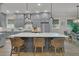 Beautiful kitchen with a large island, stainless appliances and access to the dining room at 1184 Reserve Ln, Awendaw, SC 29429