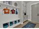 Organized mudroom with custom built-ins, cubbies, and storage cabinets, perfect for keeping belongings tidy and accessible at 1184 Reserve Ln, Awendaw, SC 29429