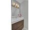Bathroom with a sink, mirror, and modern lighting at 1203 Meadow Park Ln # B, Mount Pleasant, SC 29464