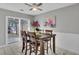 Cozy dining area with table, chairs, and sliding glass doors to the patio at 1203 Meadow Park Ln # B, Mount Pleasant, SC 29464