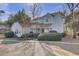 Inviting two-story home with manicured front yard, charming facade, and a well-kept lawn at 1203 Meadow Park Ln # B, Mount Pleasant, SC 29464