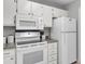 Efficient kitchen featuring white appliances, clean countertops, and ample cabinet storage at 1203 Meadow Park Ln # B, Mount Pleasant, SC 29464