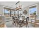 Charming dining area with natural light, stylish furniture, and scenic views at 139 Calm Water Way, Summerville, SC 29486