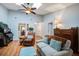 Inviting living room with vaulted ceiling, skylights, piano, and comfortable seating at 1570 Brianna Ln, Charleston, SC 29412