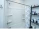 Clean bathroom area featuring a shower-tub combo with toiletry storage at 1641 Florentia St, Mount Pleasant, SC 29464