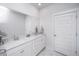 A spacious bathroom features double vanity with marble countertop and an extra-large mirror at 1641 Florentia St, Mount Pleasant, SC 29464
