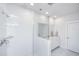 A modern bathroom showcases a glass-enclosed shower and a vanity with a marble countertop at 1641 Florentia St, Mount Pleasant, SC 29464