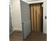 View of an open elevator with a modern accordion-style door in a residential hallway at 1641 Florentia St, Mount Pleasant, SC 29464