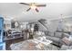 Open concept living room with dining area, hardwood floors, and stylish furnishings at 1738 Towne St, Johns Island, SC 29455