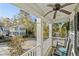 Relaxing front porch view with rocking chairs, overlooking the quiet street at 1738 Towne St, Johns Island, SC 29455