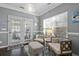 Bright sitting area with French doors, stylish furniture, and ample natural light at 1738 Towne St, Johns Island, SC 29455