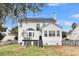 View of backyard featuring back of house and some trees in the background at 1821 Great Hope Dr, Mount Pleasant, SC 29466