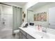 Bathroom featuring a vanity with sink, mirror, bathtub, and a shower enclosed with a curtain at 203 Pine Crest View Dr, Summerville, SC 29486