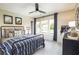 Stylish bedroom with a metal frame bed, vintage decor, and a window with soft, natural light at 203 Pine Crest View Dr, Summerville, SC 29486