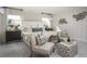 Serene bedroom with a plush bed, soft neutral tones, and stylish accents creating a relaxing retreat at 203 Pine Crest View Dr, Summerville, SC 29486