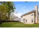A large backyard is perfect for relaxation or entertaining with lush green grass and a privacy fence at 204 Candleberry Cir, Goose Creek, SC 29445