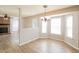Open concept space featuring hardwood floors, a fireplace and natural light at 204 Candleberry Cir, Goose Creek, SC 29445
