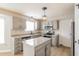 Well-equipped kitchen featuring granite countertops, stainless steel appliances, and gray cabinets at 204 Candleberry Cir, Goose Creek, SC 29445