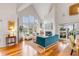 Bright living room with tall windows and a modern fireplace creating a cozy and inviting space at 204 Live Oak Dr, Mount Pleasant, SC 29464