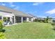 Expansive backyard with lawn, ideal for outdoor activities and gatherings at 205 Potters Pass Dr, Summerville, SC 29486