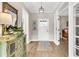 Inviting foyer with hardwood floors, a stylish mirror, and a charming rug at 205 Potters Pass Dr, Summerville, SC 29486