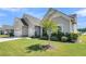 Well-kept single-Gathering home with a manicured lawn, mature landscaping and a charming curb appeal at 205 Potters Pass Dr, Summerville, SC 29486