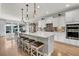 Bright kitchen featuring a large island, modern appliances, and ample cabinet space at 205 Potters Pass Dr, Summerville, SC 29486