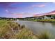Manicured community pond with beautiful landscaping and a fountain feature throughout this desirable community at 205 Potters Pass Dr, Summerville, SC 29486