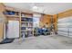 This garage offers ample storage, shelving, and a fridge for added convenience at 207 Billinger St, Summerville, SC 29486