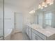 Bright bathroom with double vanity, modern lighting and soaking tub for a spa-like retreat at 219 Clearblue Loop, Summerville, SC 29486