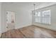 Dining room featuring wood floors, a chandelier, and a view into another room at 219 Clearblue Loop, Summerville, SC 29486