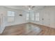 Spacious and bright living room with hardwood floors and three windows at 219 Clearblue Loop, Summerville, SC 29486